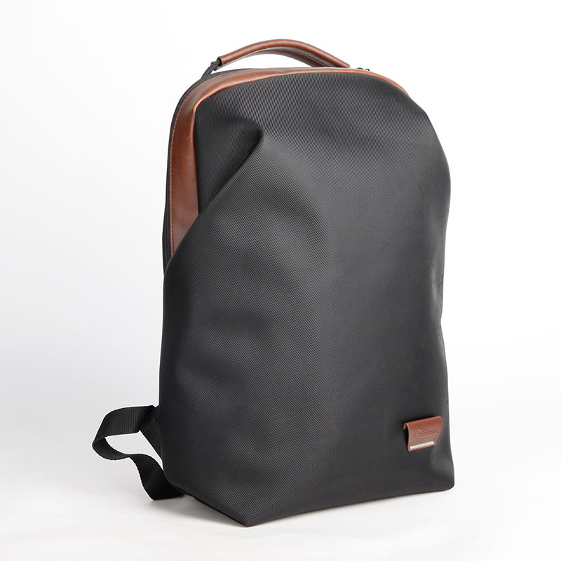 休闲男女通勤双肩背包